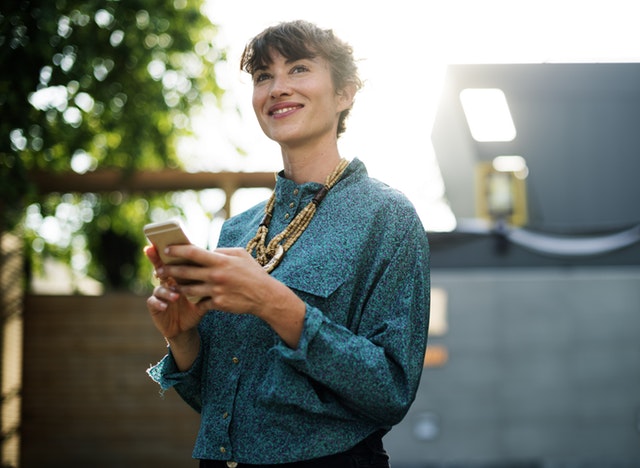 Woman holding a smartphone